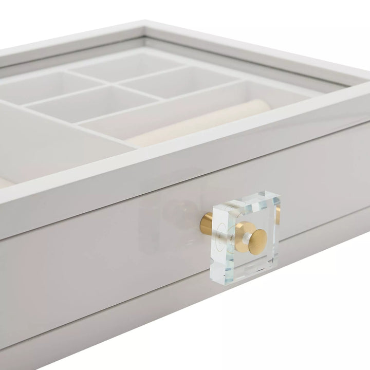 White Widdop &amp; Co jewellery box with compartments and a drawer, featuring a sleek design for storing jewelry and accessories.