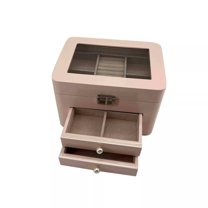 Pink wooden jewellery box with compartments and two drawers by Widdop &amp; Co, featuring a decorative finish and organized storage space.