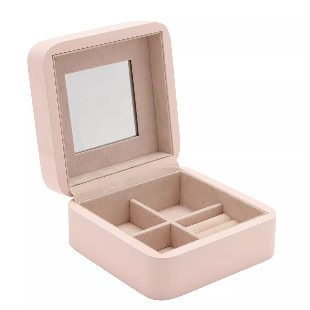 Pink jewellery box by Widdop & Co from Cornucopia Home and Gift, featuring a decorative design with jewelry storage compartments.