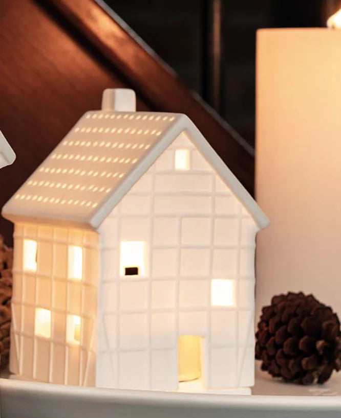 Radër half-timbered tea light house by Cornucopia Home and Gift featuring a charming timber design with windows and a peaked roof.