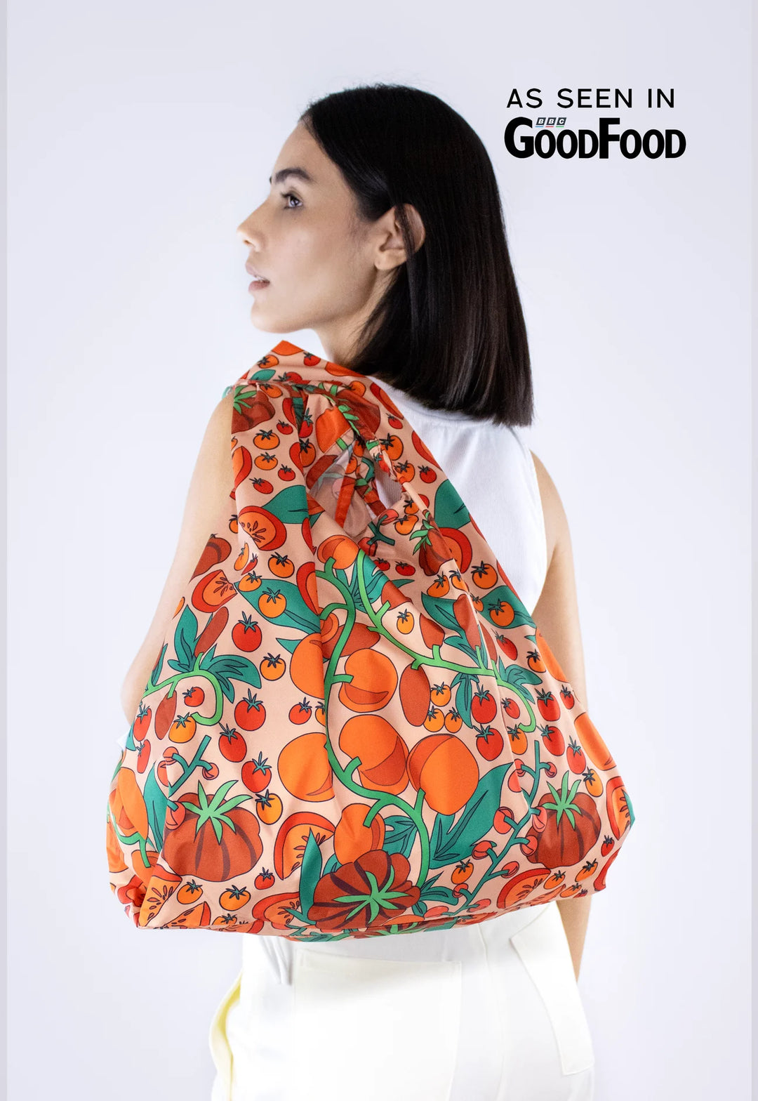 Medium reusable bag from Kind Bags by Cornucopia Home and Gift filled with fresh tomatoes.
