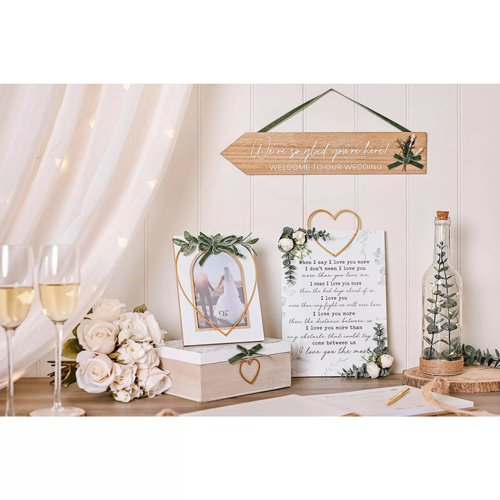 Love Story Hanging Arrow Plaque by Widdop &amp; Co from Cornucopia Home and Gift, featuring a rustic arrow design with love-themed text.