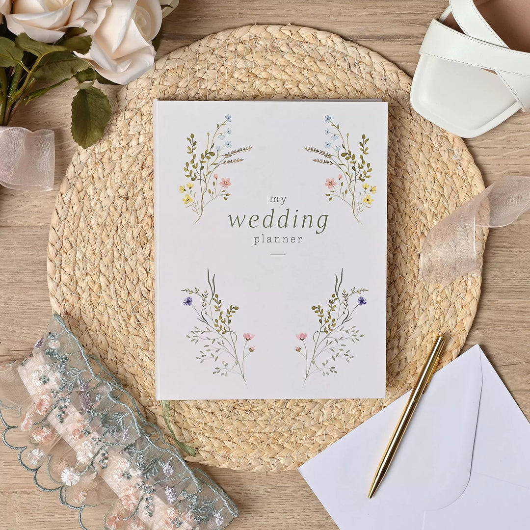 Wildflower wedding planner by Widdop & Co featuring floral cover design, ideal for organizing wedding details and schedules.