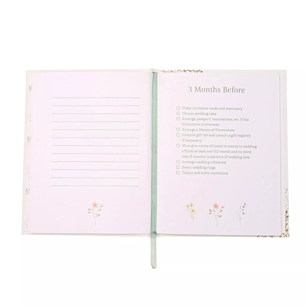 Wildflower wedding planner by Widdop & Co with floral cover and spiral binding, designed for organizing wedding details.