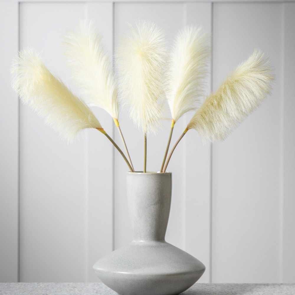 Five soft ivory feather stems from Cornucopia Home and Gift, elegant gallery floral arrangement for home decor.