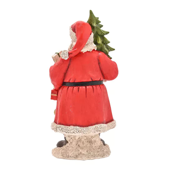 Father Christmas figurine with a Christmas tree from Widdop &amp; Co Cornucopia Home and Gift, detailed holiday holiday decoration