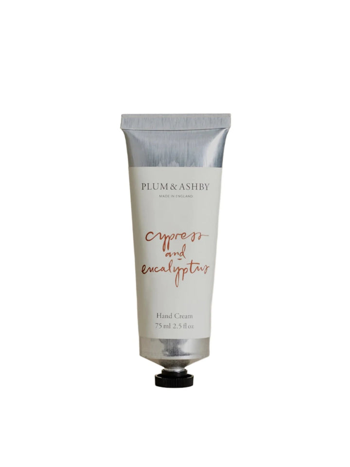Cornucopia Home and Gift Cypress &amp; Eucalyptus hand cream tube with botanical design and product label visible.