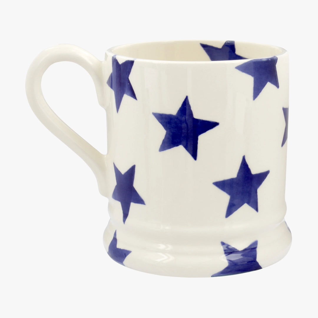 Emma Bridgewater Blue Star half pint ceramic mug with blue star design on white background.