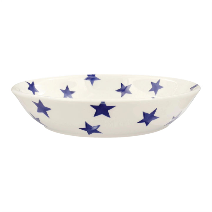 Emma Bridgewater Blue Star medium pasta bowl with a blue star pattern on white ceramic, showcasing its detailed design.