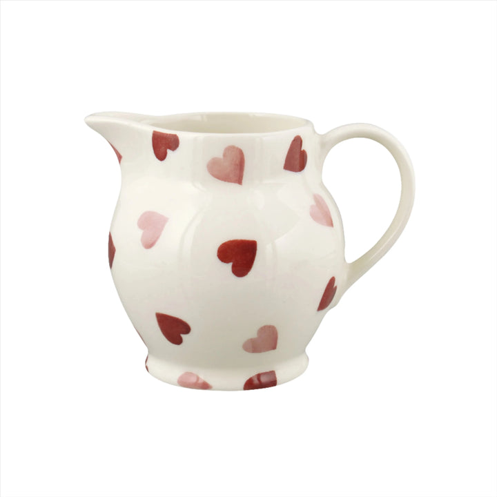 Emma Bridgewater Pink Hearts half pint ceramic jug with pink heart pattern on white background.