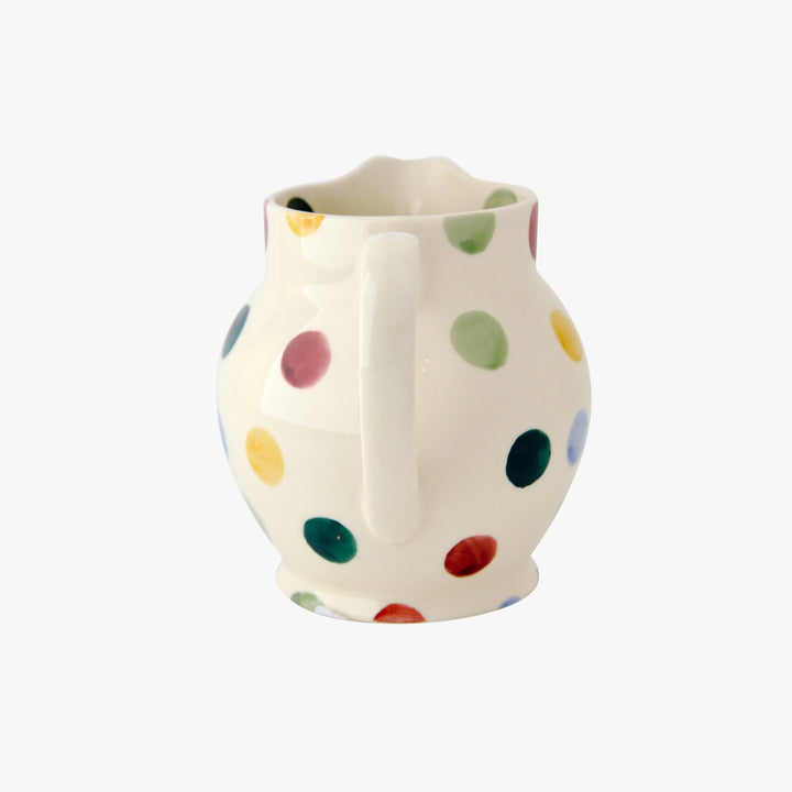 Emma Bridgewater Polka Dot Half Pint Jug featuring gray polka dots and a classic ceramic design.