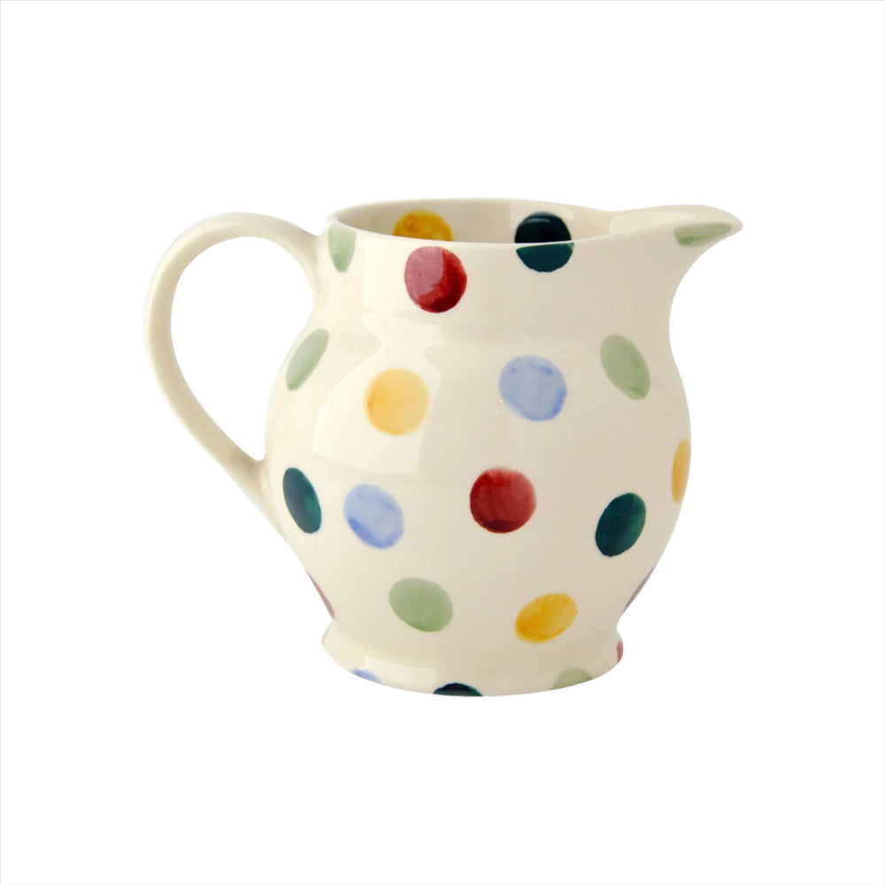 Emma Bridgewater Polka Dot Half Pint Jug in gray ceramic with white polka dots, featuring a classic, charming design.