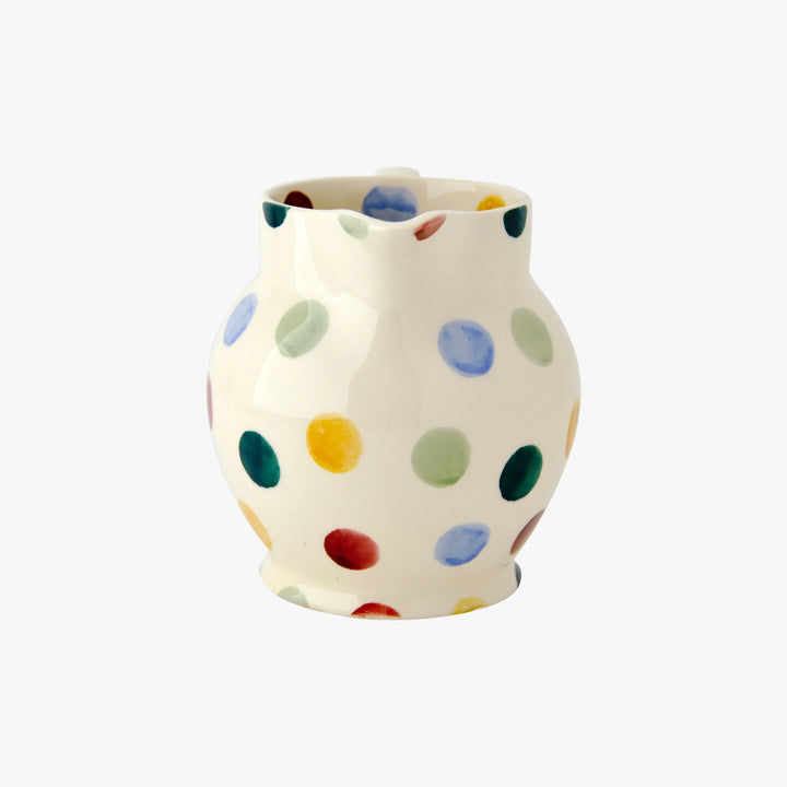 Emma Bridgewater Polka Dot Half Pint Jug featuring gray polka dots and a classic ceramic design on a white background.