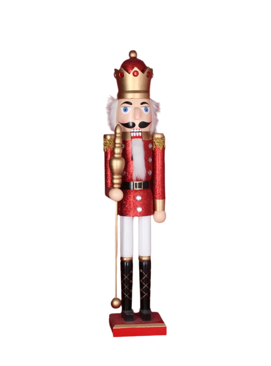 Red, white, and gold wood nutcracker figurine from Gisela Graham Christmas collection, displayed against a neutral background.