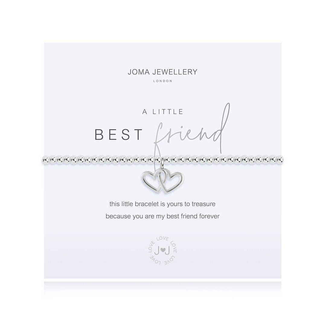 Joma Jewellery A Little Best Friend bracelet featuring a silver charm with engraved message, displayed on a soft fabric background.