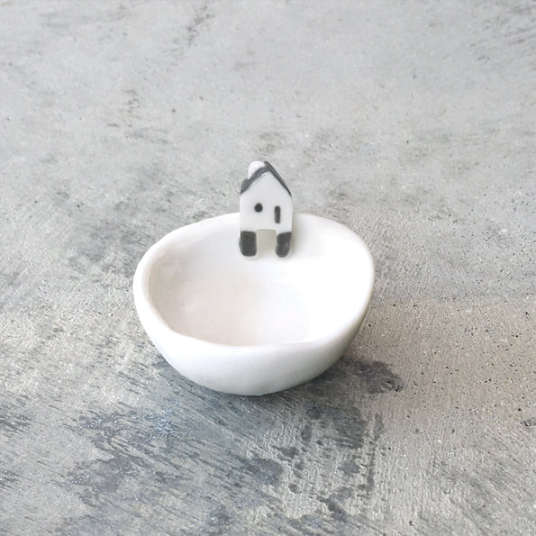 East of India Little Bowl from Cornucopia Home and Gift with a rustic cabin design, small ceramic bowl on a wooden surface.