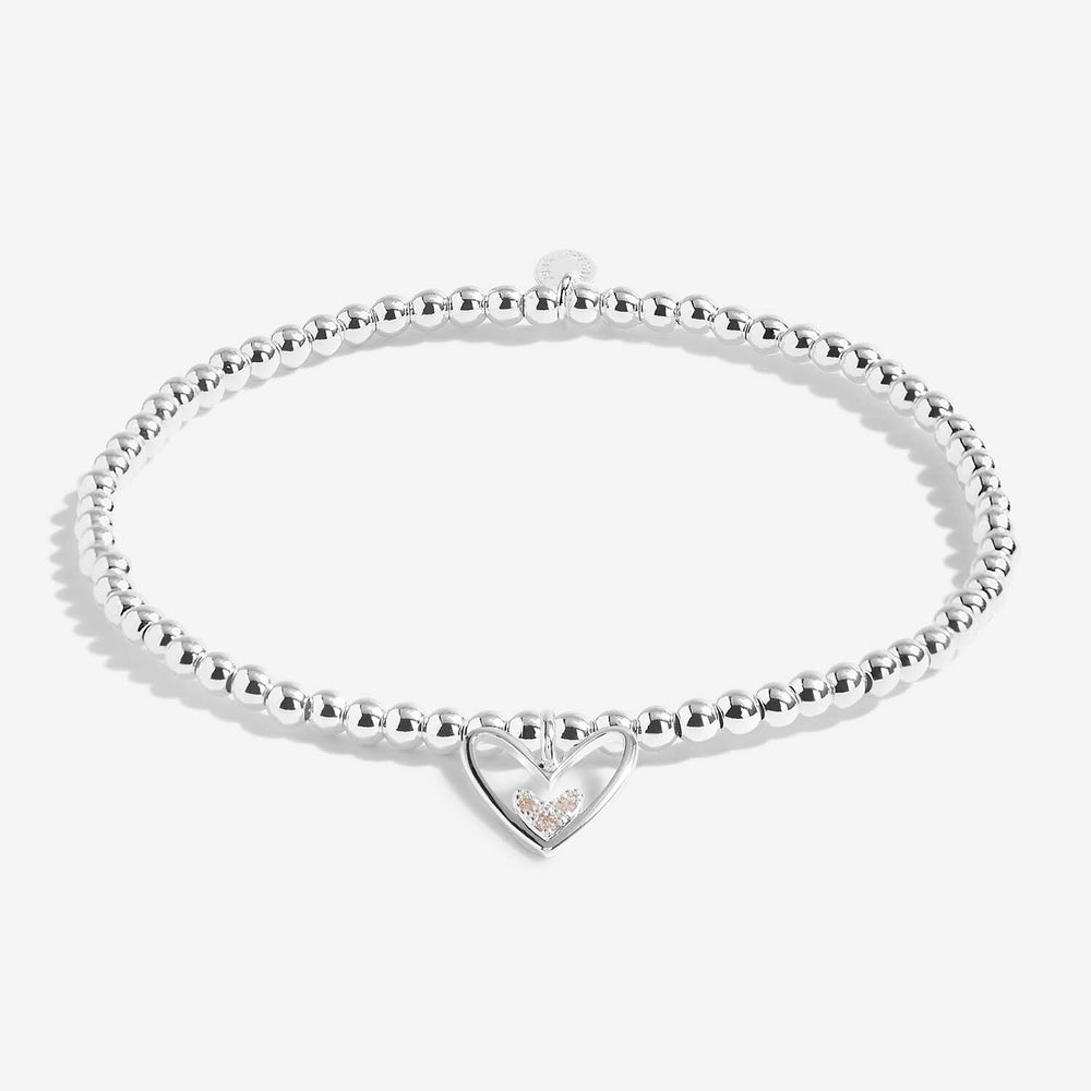Joma Jewellery "A Little Its A Girl!" bracelet with delicate silver chain and pendant, featuring a charming girl-themed charm.