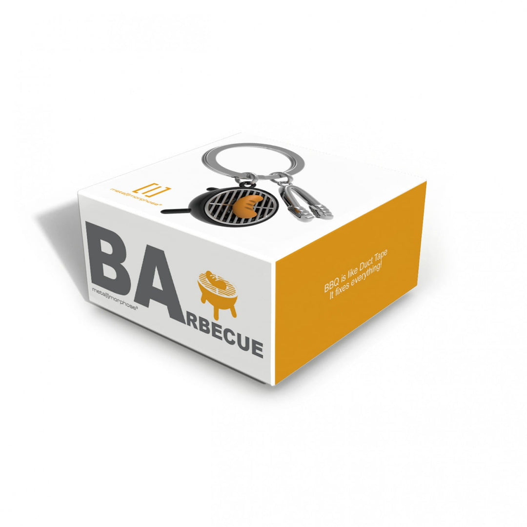 Oli Olsen BBQ keyring featuring a miniature barbecue grill design, attached to a metal keyring, perfect for BBQ enthusiasts.