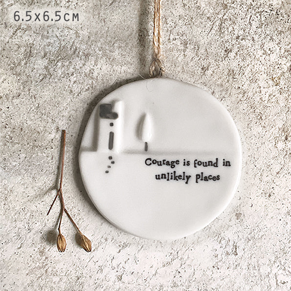 East of India Courage is Found hanging moon wall decor with rustic design and soft neutral tones.