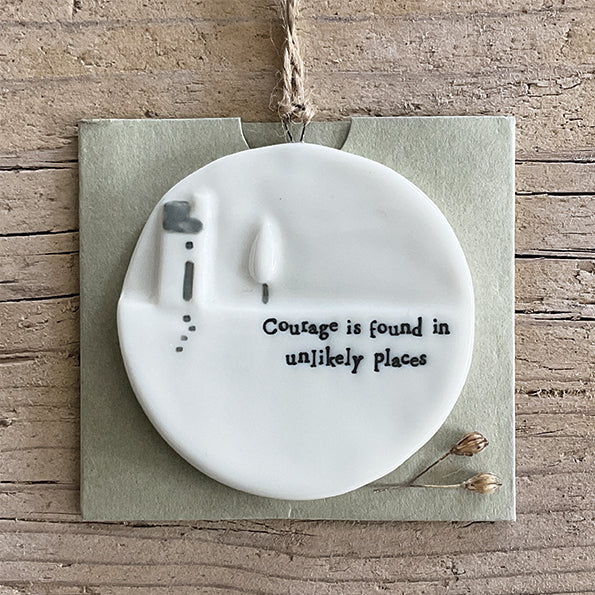 East of India Courage is Found hanging moon decor by Cornucopia Home and Gift, featuring a rustic metal moon with inspirational text.