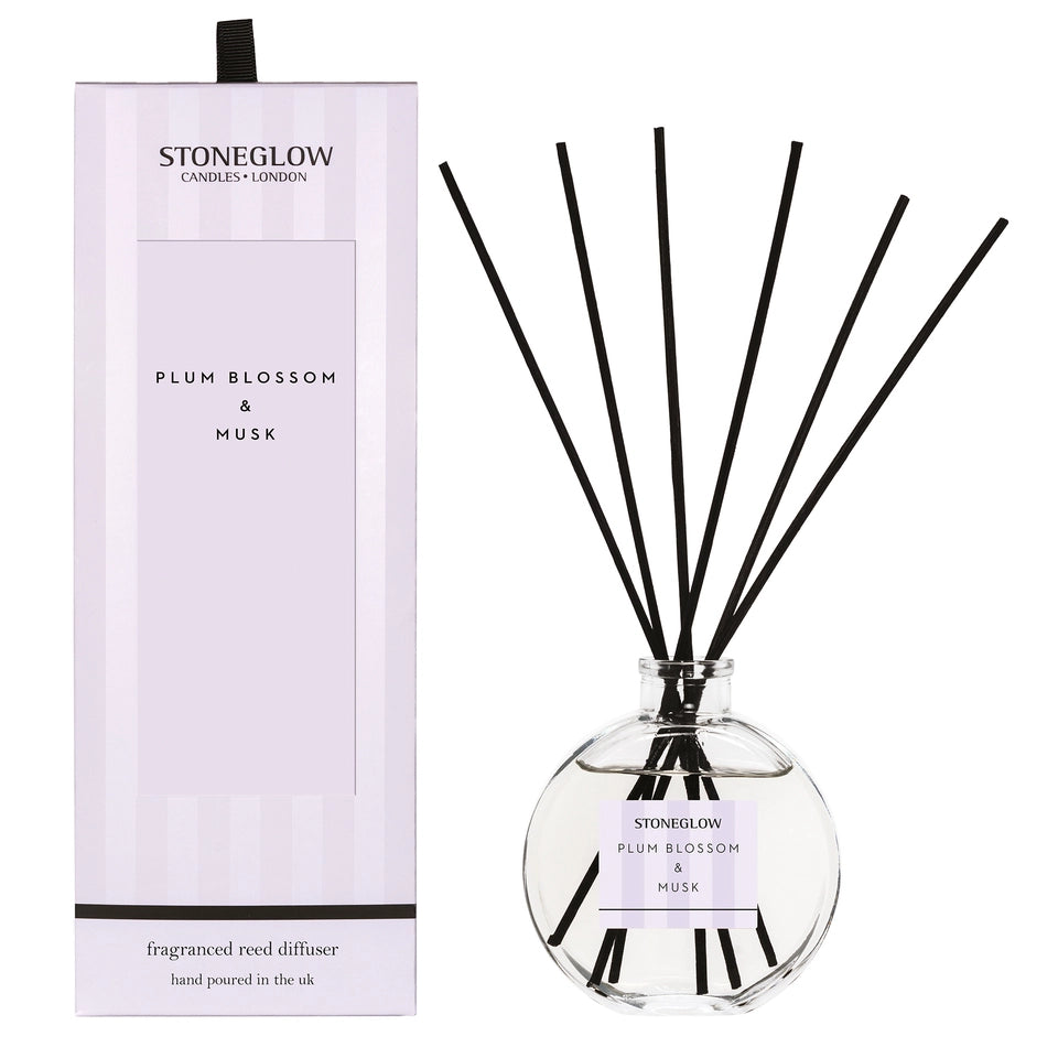 Stoneglow Modern Classics Plum Blossom and Musk reed diffuser with glass bottle and reeds for home fragrance.