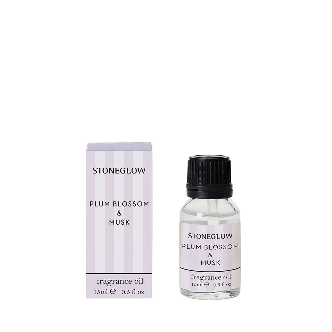 Stoneglow Modern Classics Plum Blossom and Musk oil in a 15ml glass bottle with a minimalist label design.