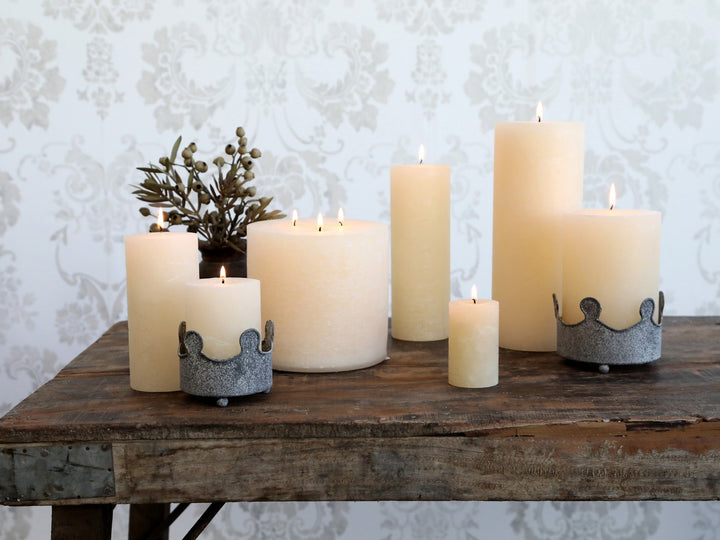 Cream pillar candle by Chic Antique with a classic design, providing up to 150 hours of warm, ambient light.