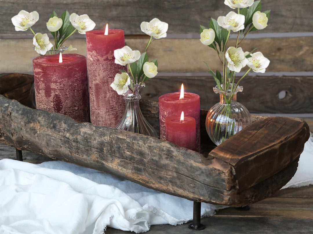 Dark red maroon pillar candle by Chic Antique with a tall, elegant design, ideal for home décor and creating cozy ambiance.