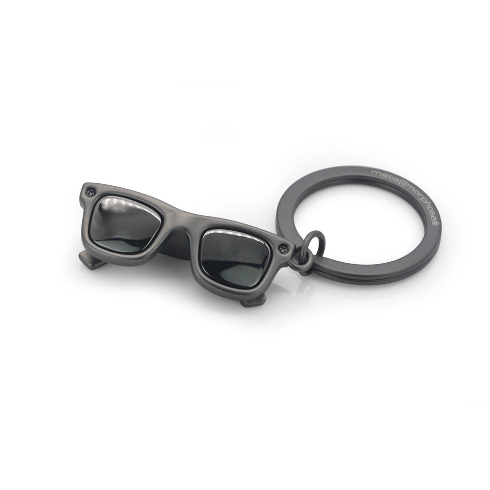 Oli Olsen sunglasses keyring with gold-tone frame and black sunglasses design, attached to a keyring loop.