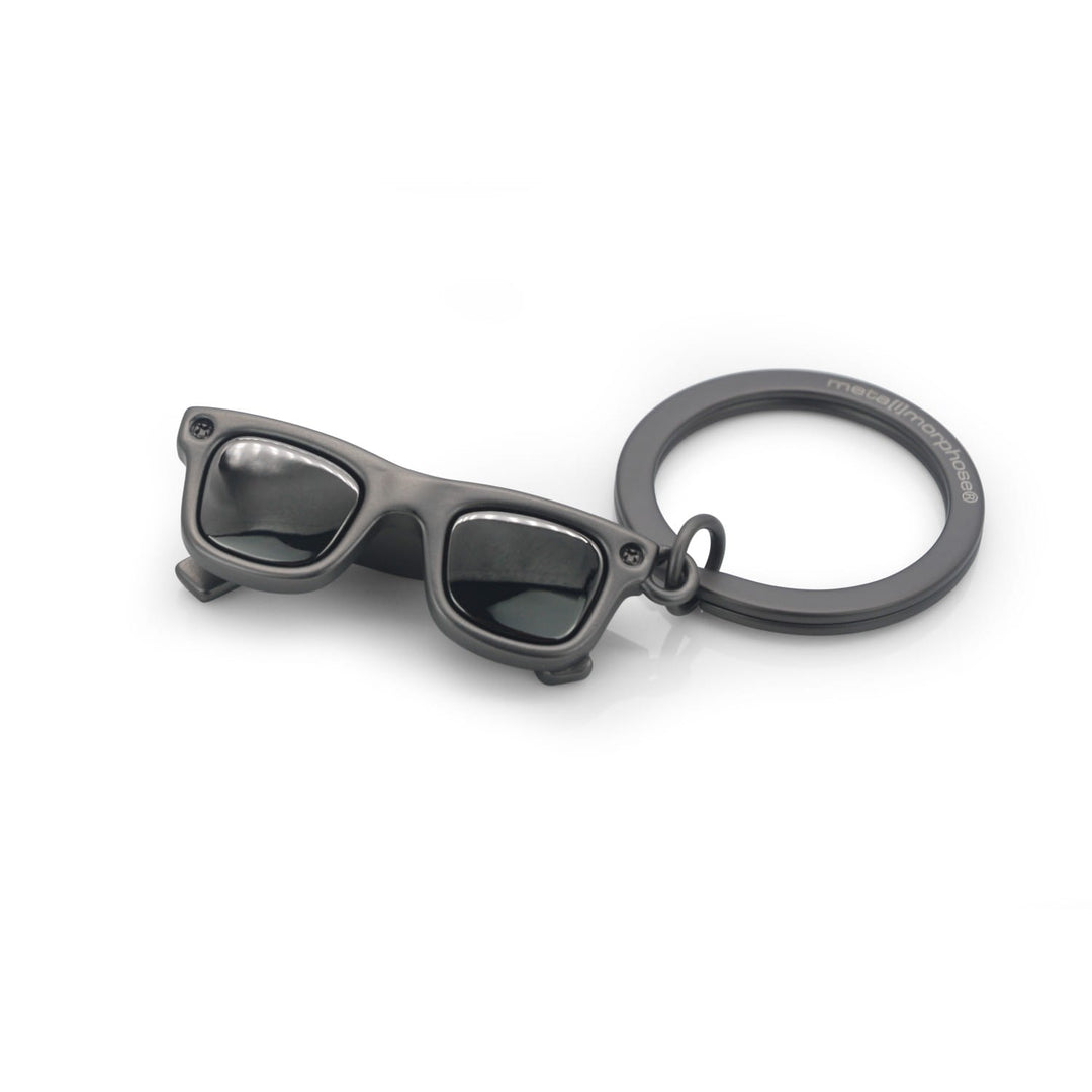 Oli Olsen sunglasses keyring with gold-tone frame and black sunglasses design, attached to a keyring loop.