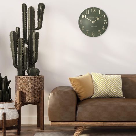 Lichen green 12-foot Arabic wall clock by Cornucopia Home and Gift, featuring bold Arabic numerals and a modern design.