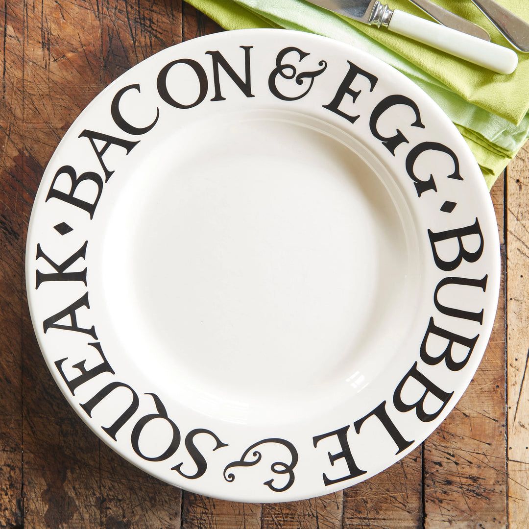Emma Bridgewater Black Toast Bacon &amp; Egg 10.5-inch decorative plate featuring black toast, bacon, and eggs in vibrant design.