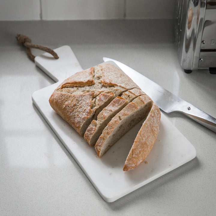 Rectangular marble chopping board from Garden Trading, perfect for kitchen prep and serving, with a smooth, polished surface.