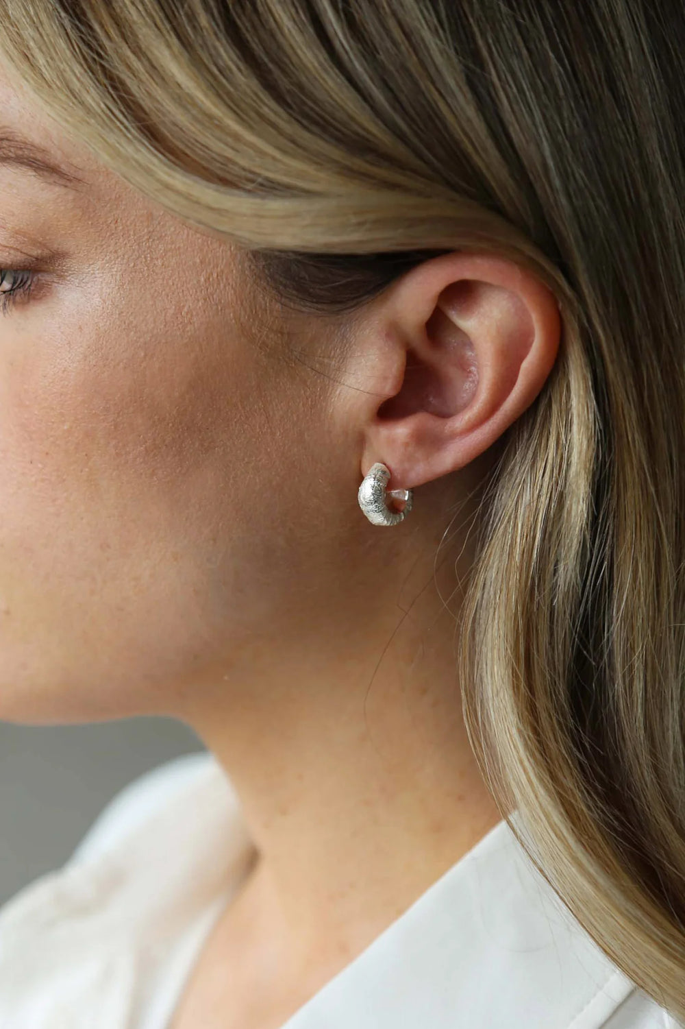 Silver cast earrings by Tutti & Co, featuring intricate design, displayed on a neutral background for Cornucopia Home and Gift.