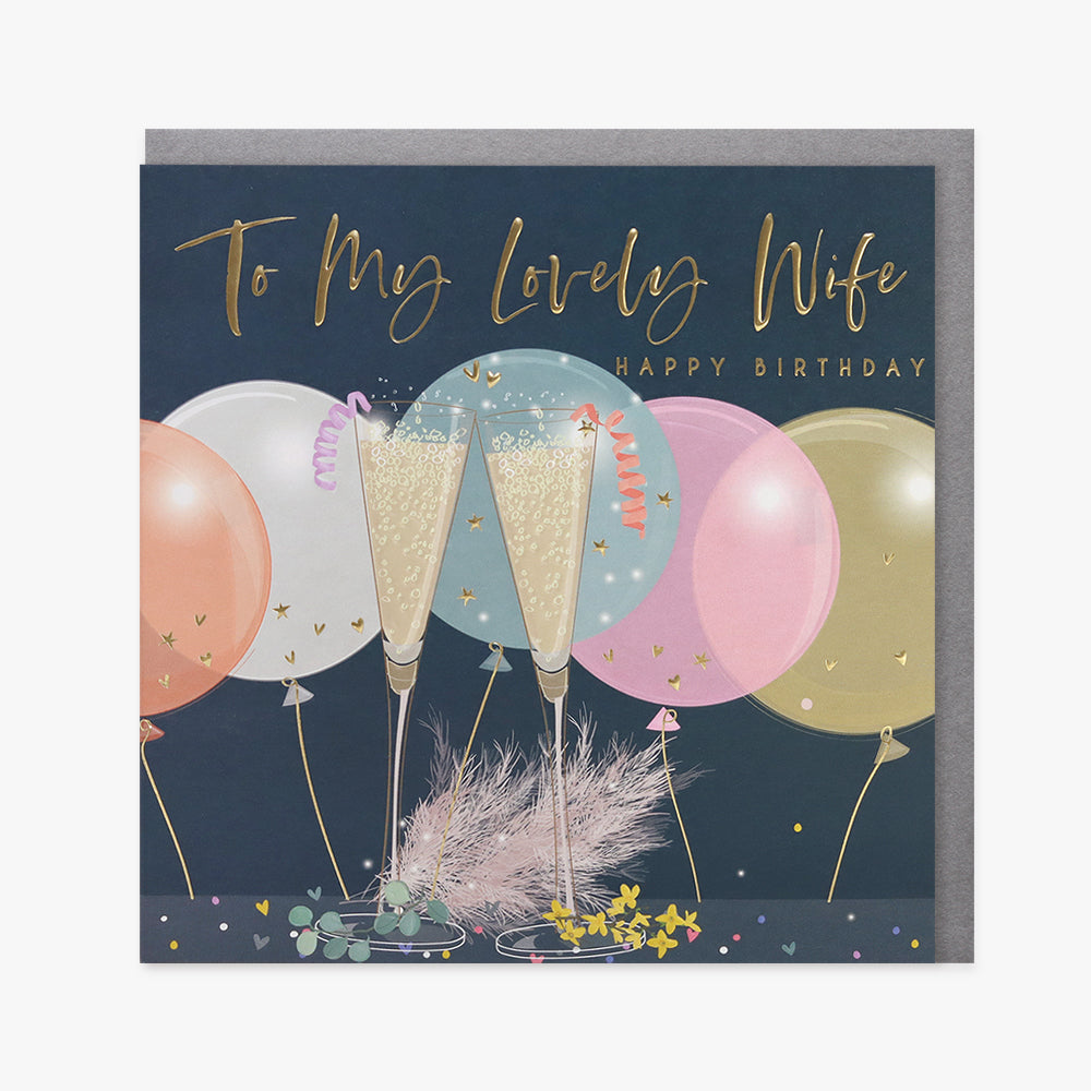Belly button-shaped birthday card featuring a humorous wife-themed design by Cornucopia Worcester, perfect for celebrating her special day.