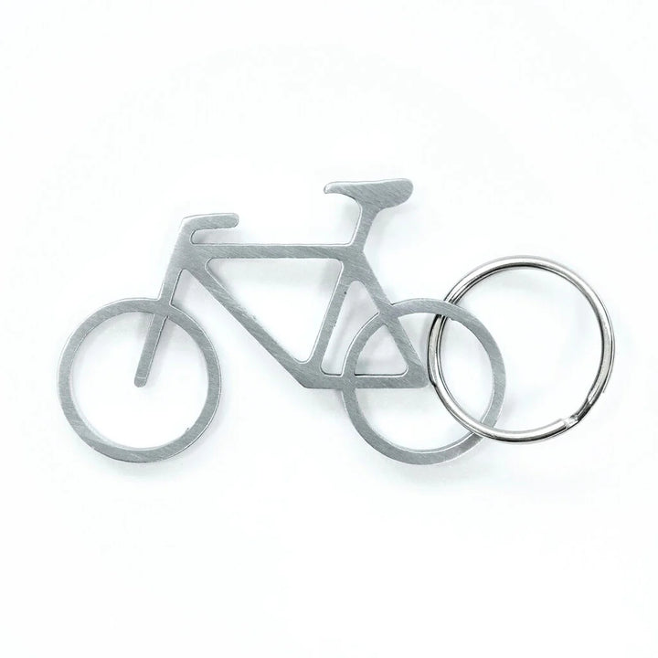 Kikkerland bike keyring with integrated bottle opener, featuring a compact metal design for everyday use.