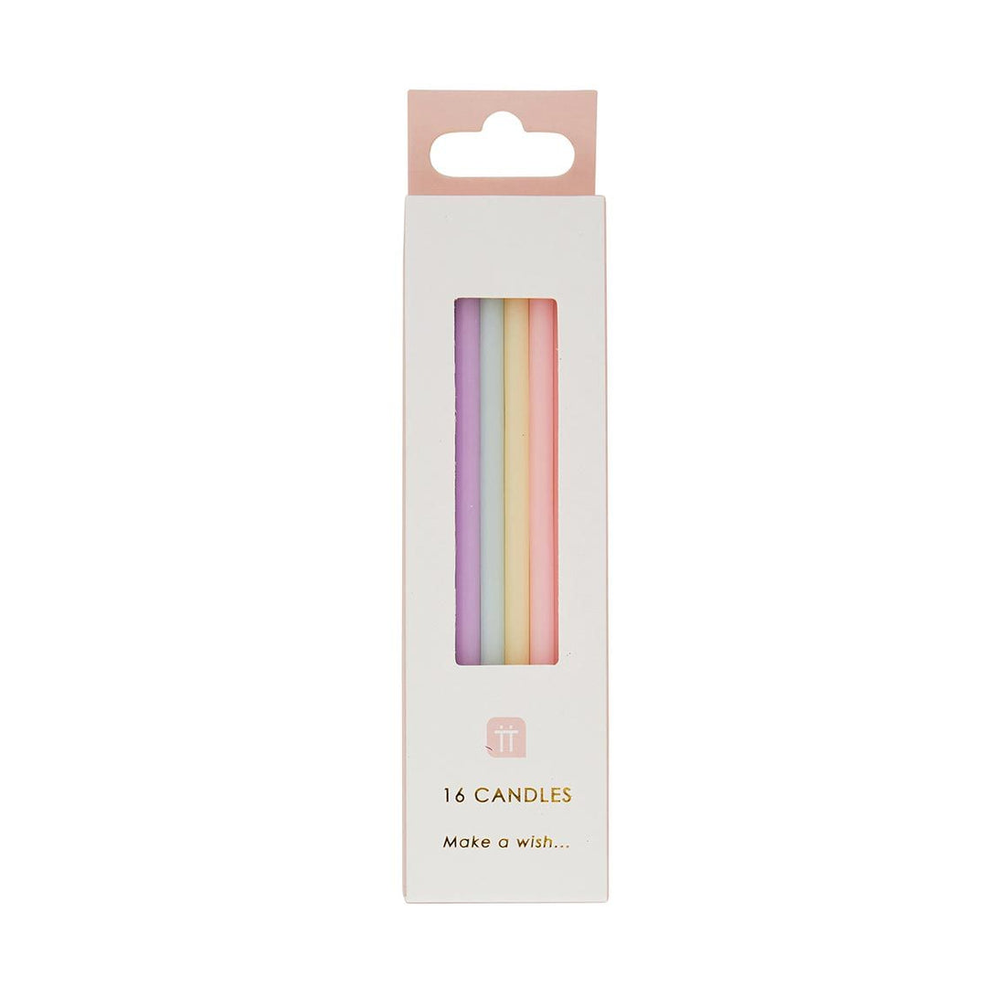 Set of 16 tall pastel candles from Cornucopia Home and Gift, 10cm, featuring soft colors and smooth wax surface.