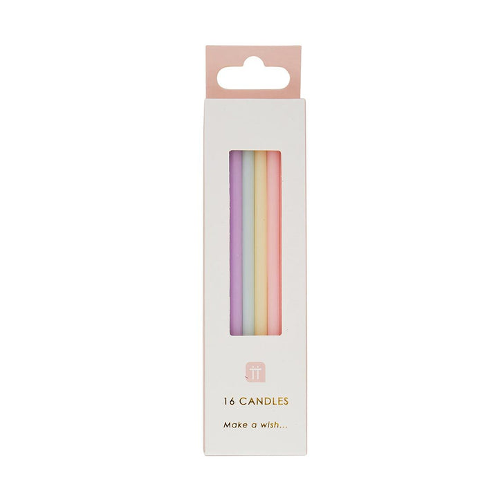 Set of 16 tall pastel candles from Cornucopia Home and Gift, 10cm, featuring soft colors and smooth wax surface.