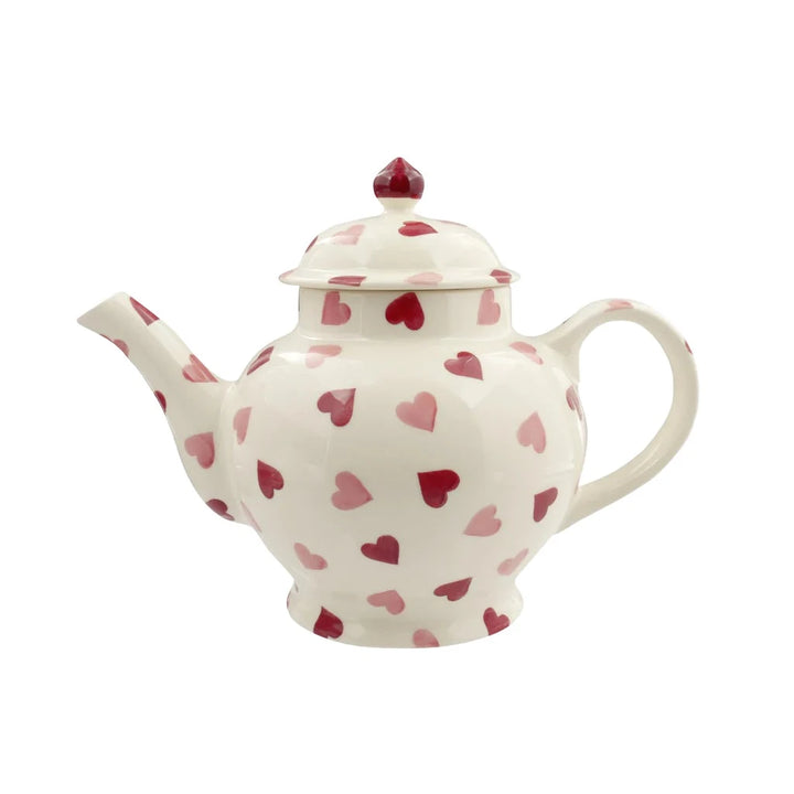 Emma Bridgewater pink hearts teapot with matching four mugs, decorated with charming pink heart patterns, in a boxed set.