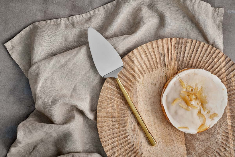 Nkuku Sirkali cake slice with brushed gold finish, elegant serving utensil for desserts and cakes, modern and stylish design