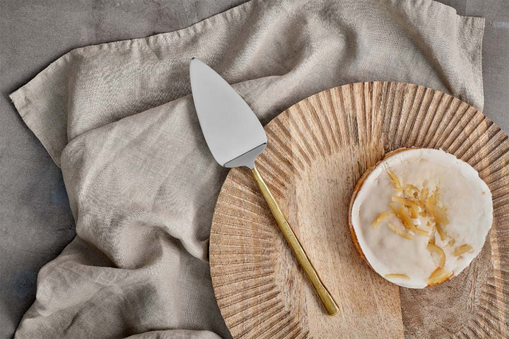 Nkuku Sirkali cake slice with brushed gold finish, elegant serving utensil for desserts and cakes, modern and stylish design