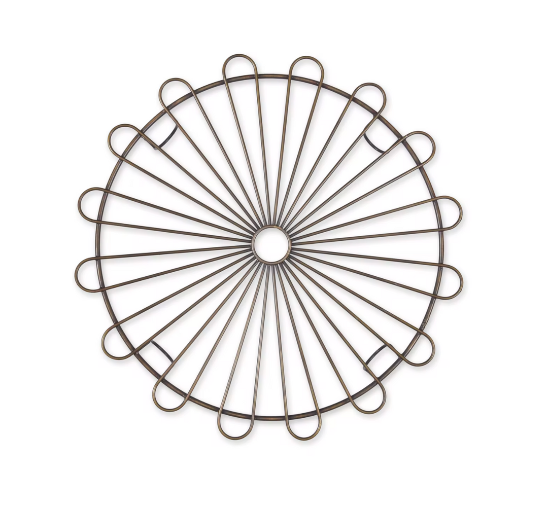 Garden Trading Brompton Cake Rack in antique brass, featuring a decorative metal design for elegant cake display.