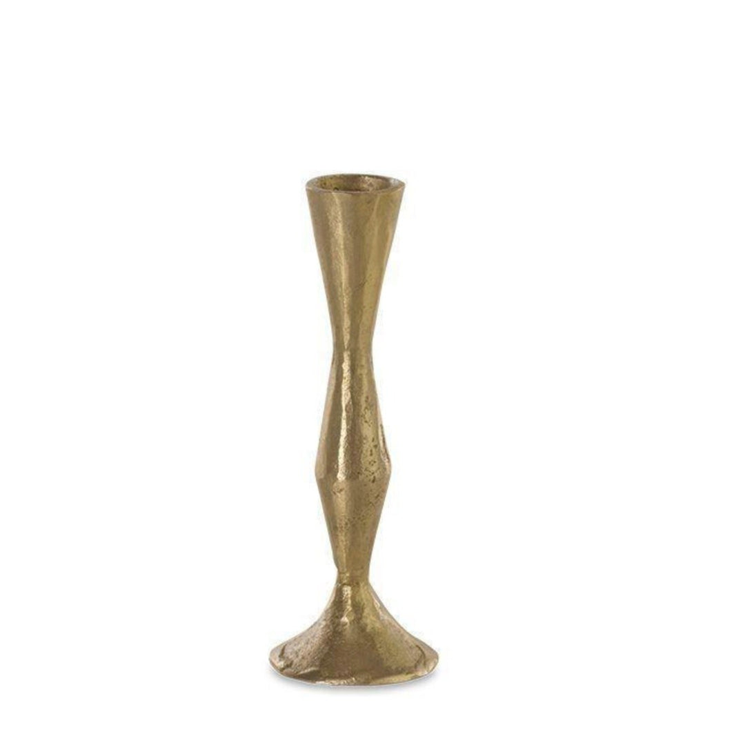 Nkuku Jahi tall brass candlestick with a sleek, polished finish, designed for elegant table or mantel decoration.