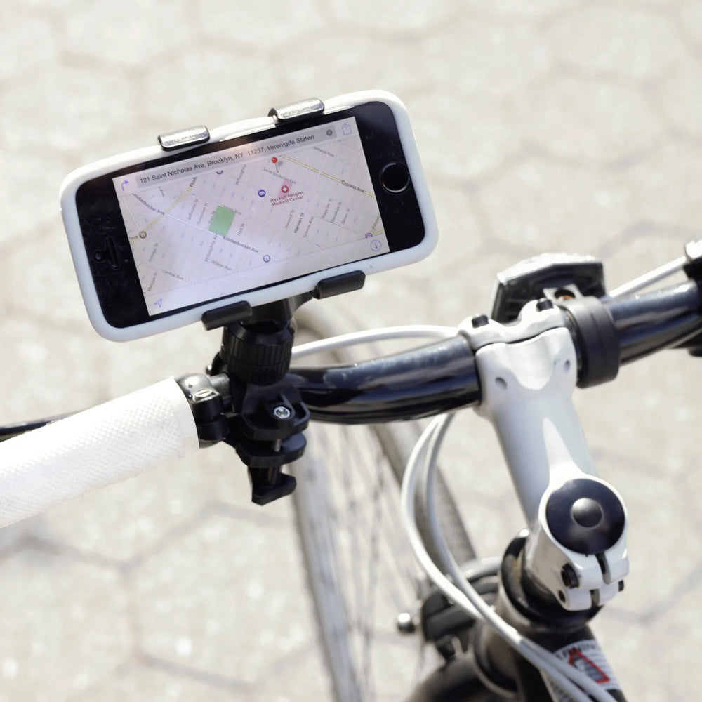 Black Kikkerland bike phone holder with secure grip and adjustable mount, designed for easy access on cycling trips.