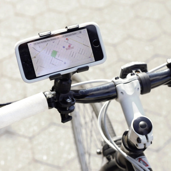 Black Kikkerland bike phone holder with secure grip and adjustable mount, designed for easy access on cycling trips.