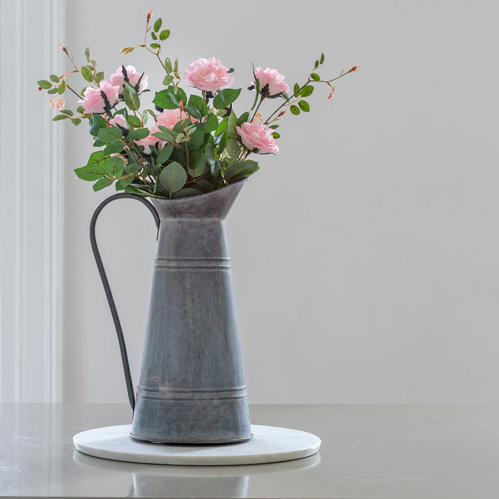 Soft pink Rose Spray from Grand Illusions by Cornucopia Worcester, featuring delicate pink roses arranged in a natural floral display.