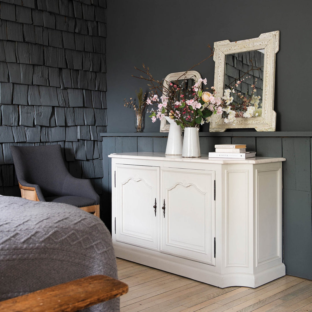 Albury double door sideboard by Cornucopia Home with white marble top and wooden finish, showcasing storage cabinets.