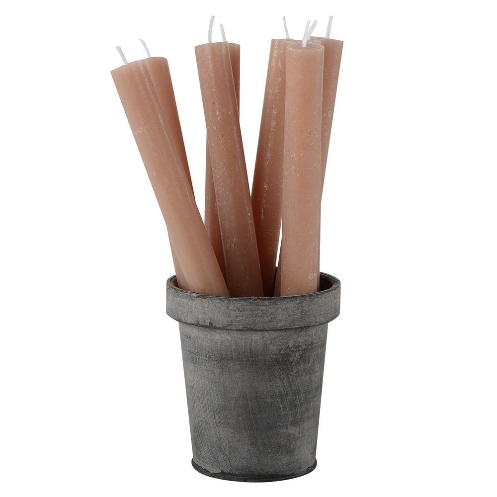 Rustic caramel-colored dinner candle from Grand Illusions by Cornucopia Home and Gift, with textured wax and flickering flame.