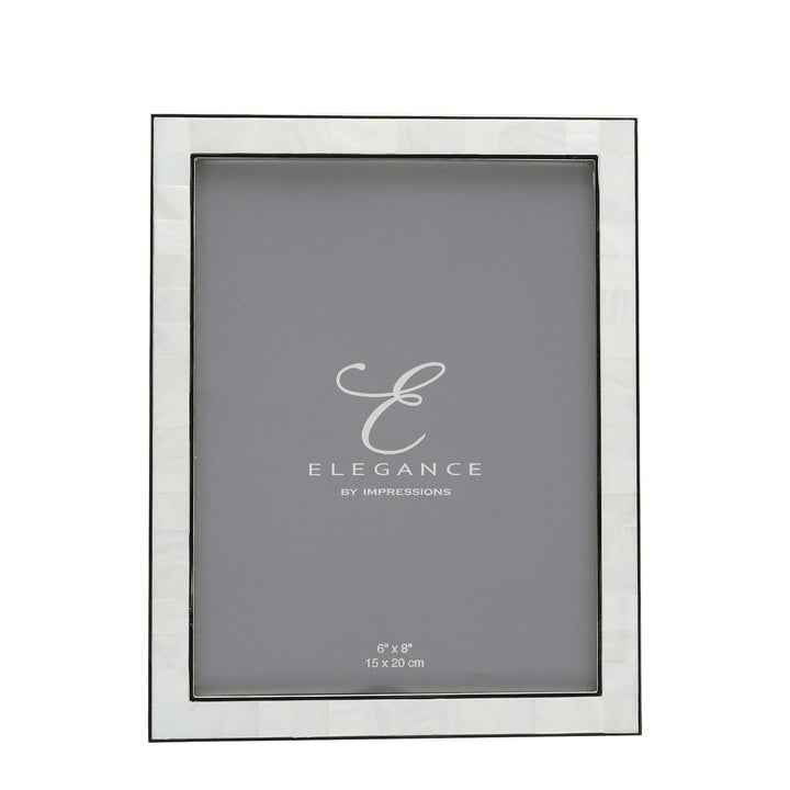 Metal and mother of pearl photo frame by Widdop &amp; Co from Cornucopia Home and Gift, showcasing a decorative frame with intricate details.