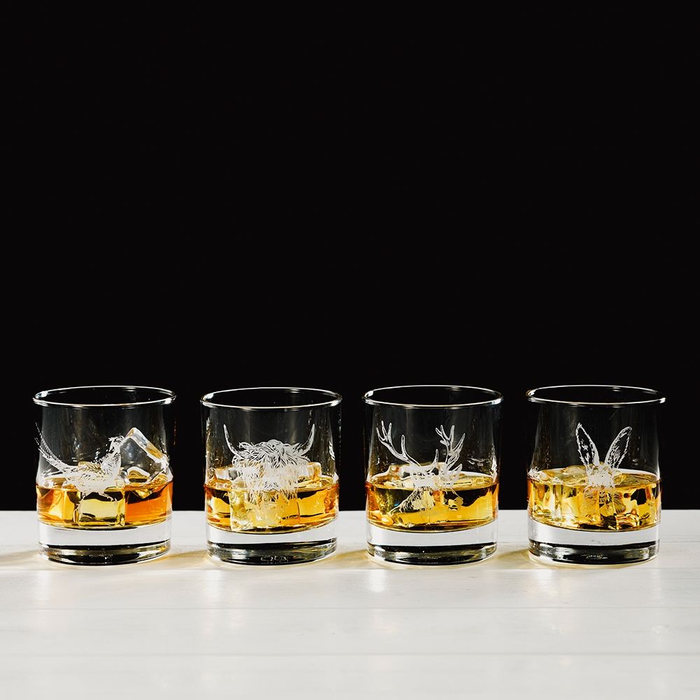 Set of four Selbrae House country animals engraved glass tumblers by Cornucopia Home and Gift, featuring detailed engraved animal designs.